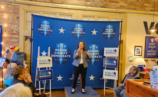 Sara Rodriguez speaking at event with Racine County Democrats